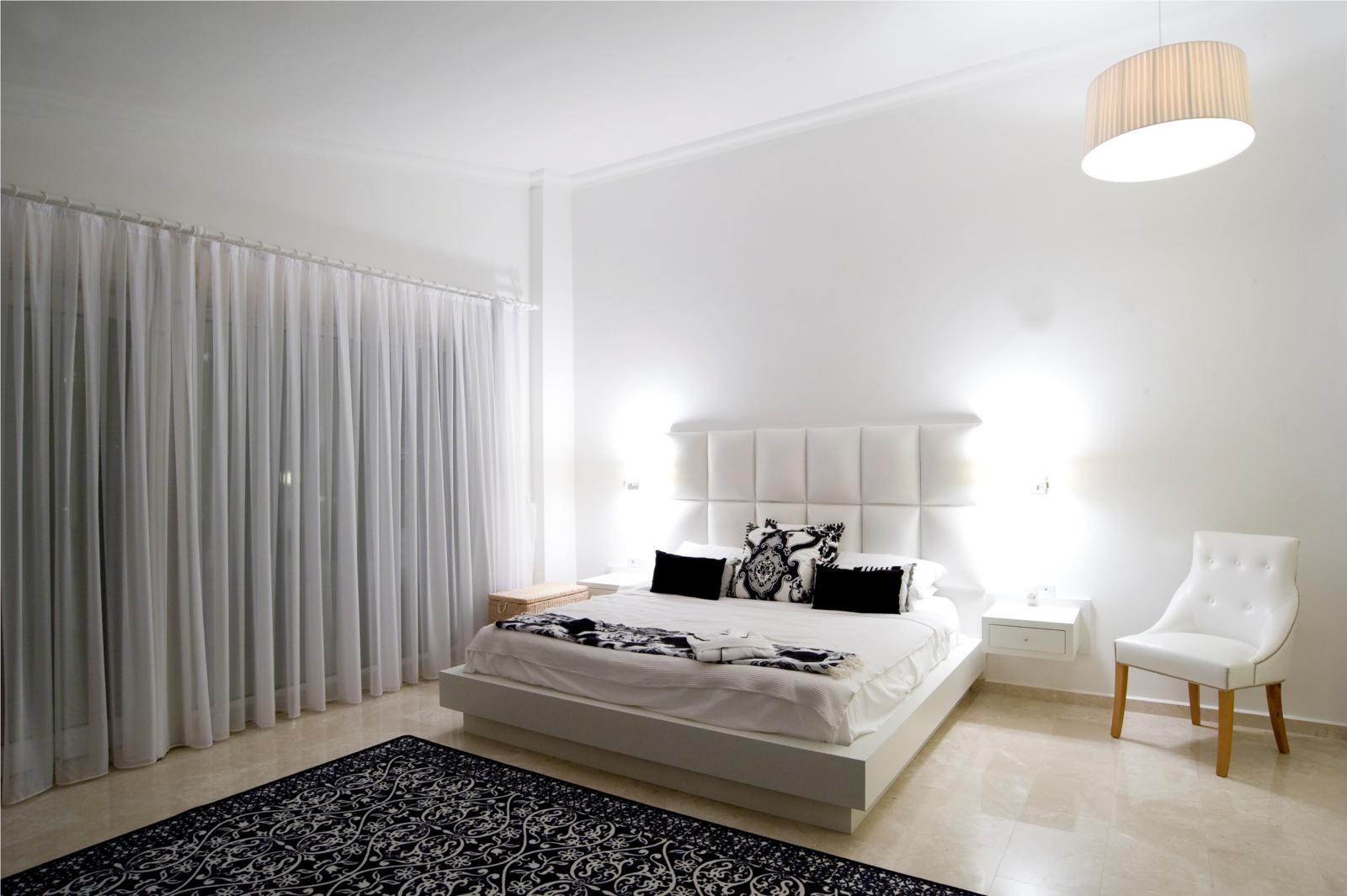 Spacious double bedroom with modern decor